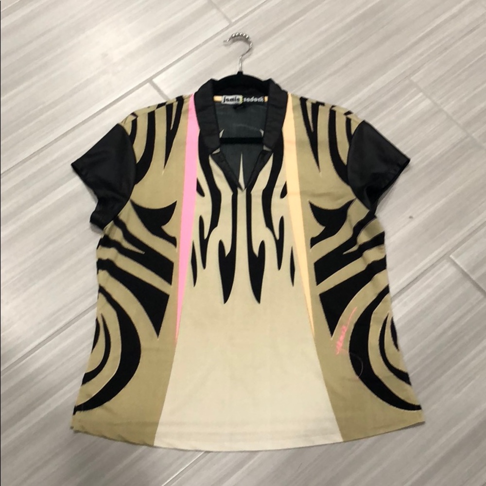 Golf shirt by Jamie sadock.